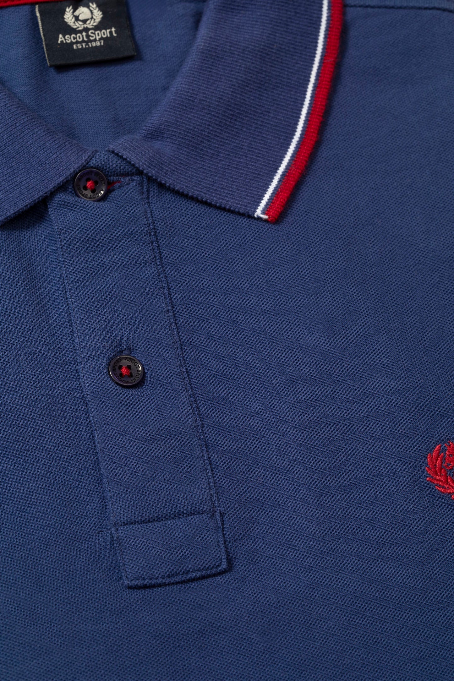 Polo in piquet di cotone con logo sottocollo e doppio contrasto su collo e polsi