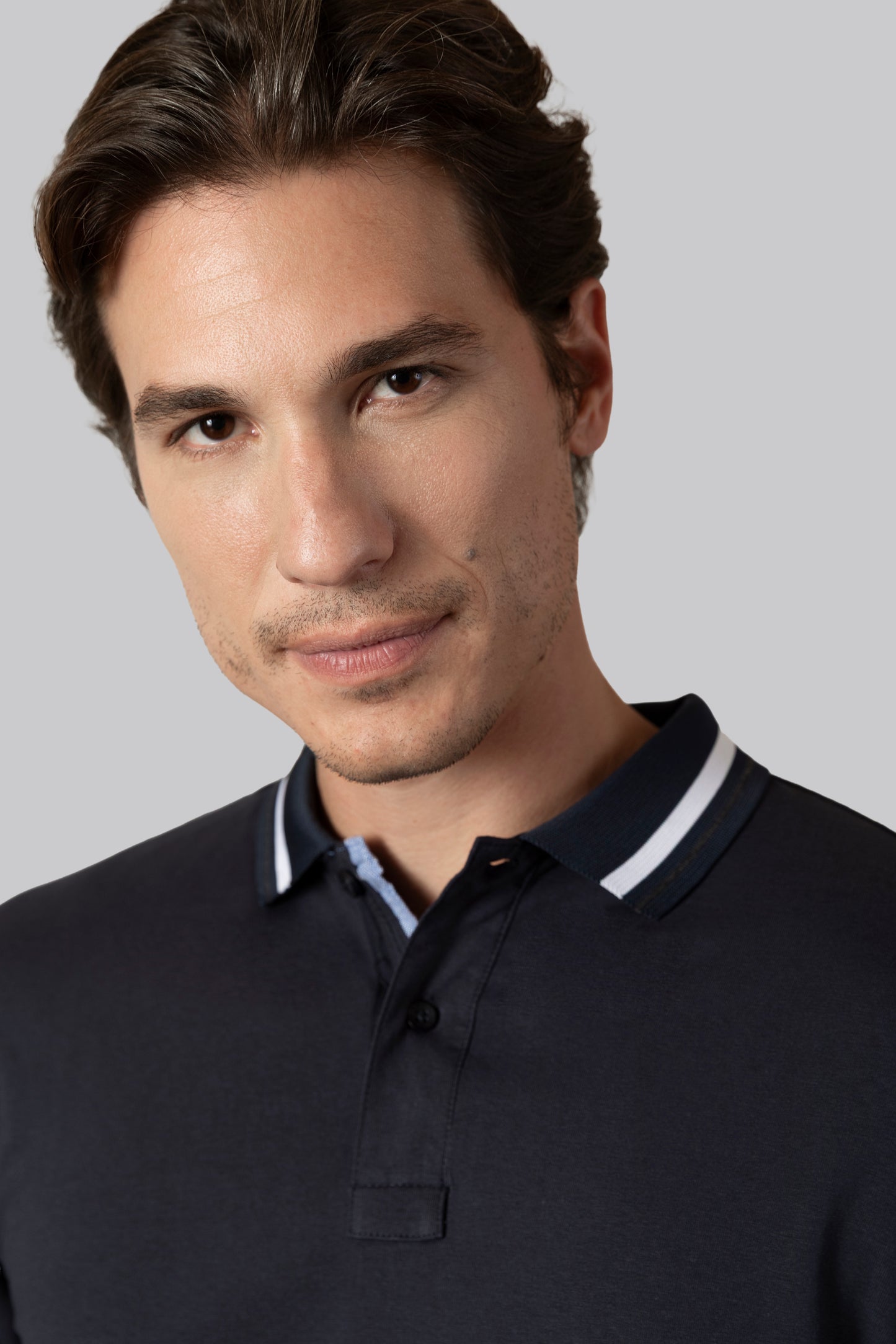 BiStretch jersey polo with contrasting detail on the collar