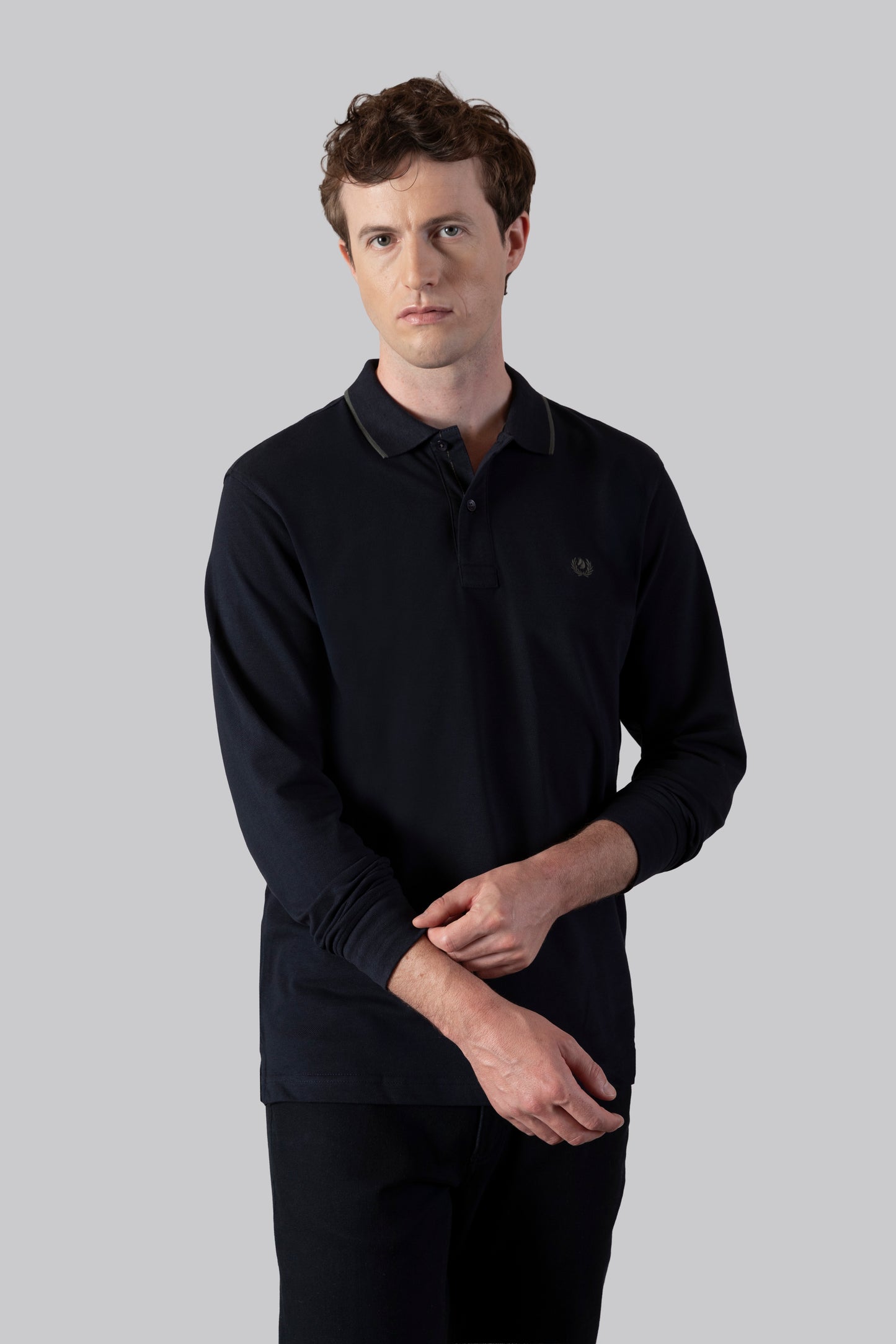 Piqué polo with contrasting stripe color on the collar and logo print under the collar