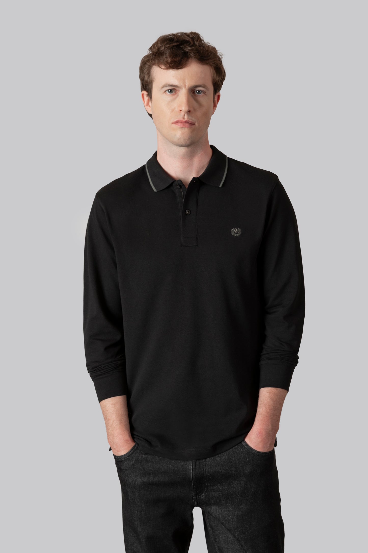 Piqué polo with contrasting stripe color on the collar and logo print under the collar