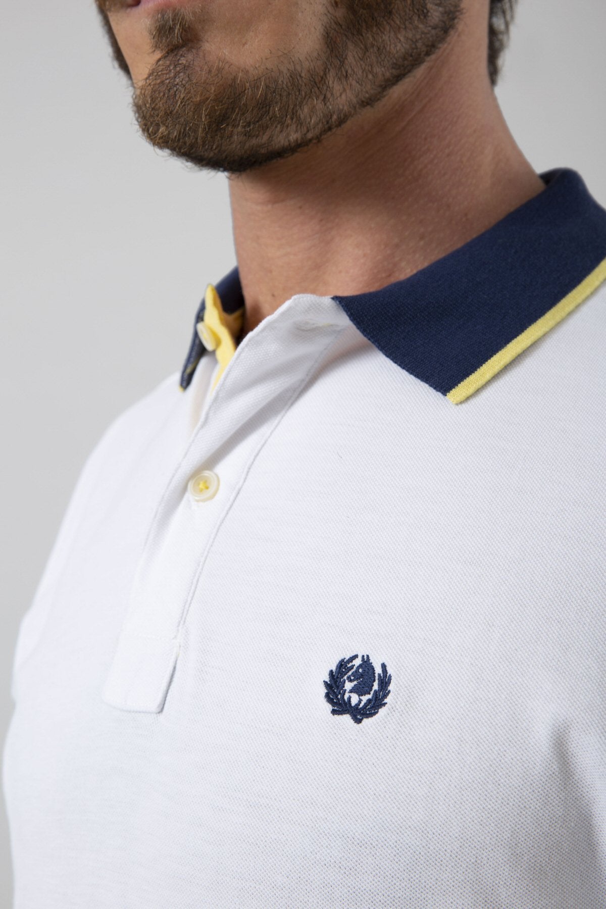 Polo in piquet con sottocollo rigato