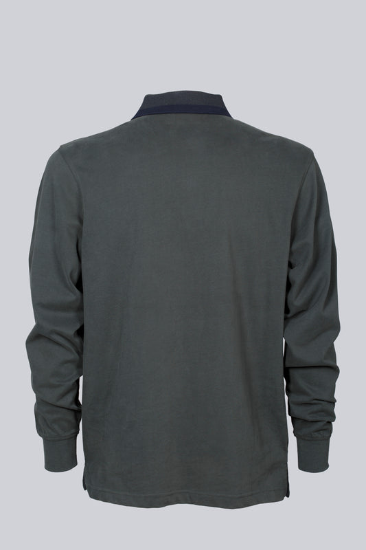 Green polo with contrasting details