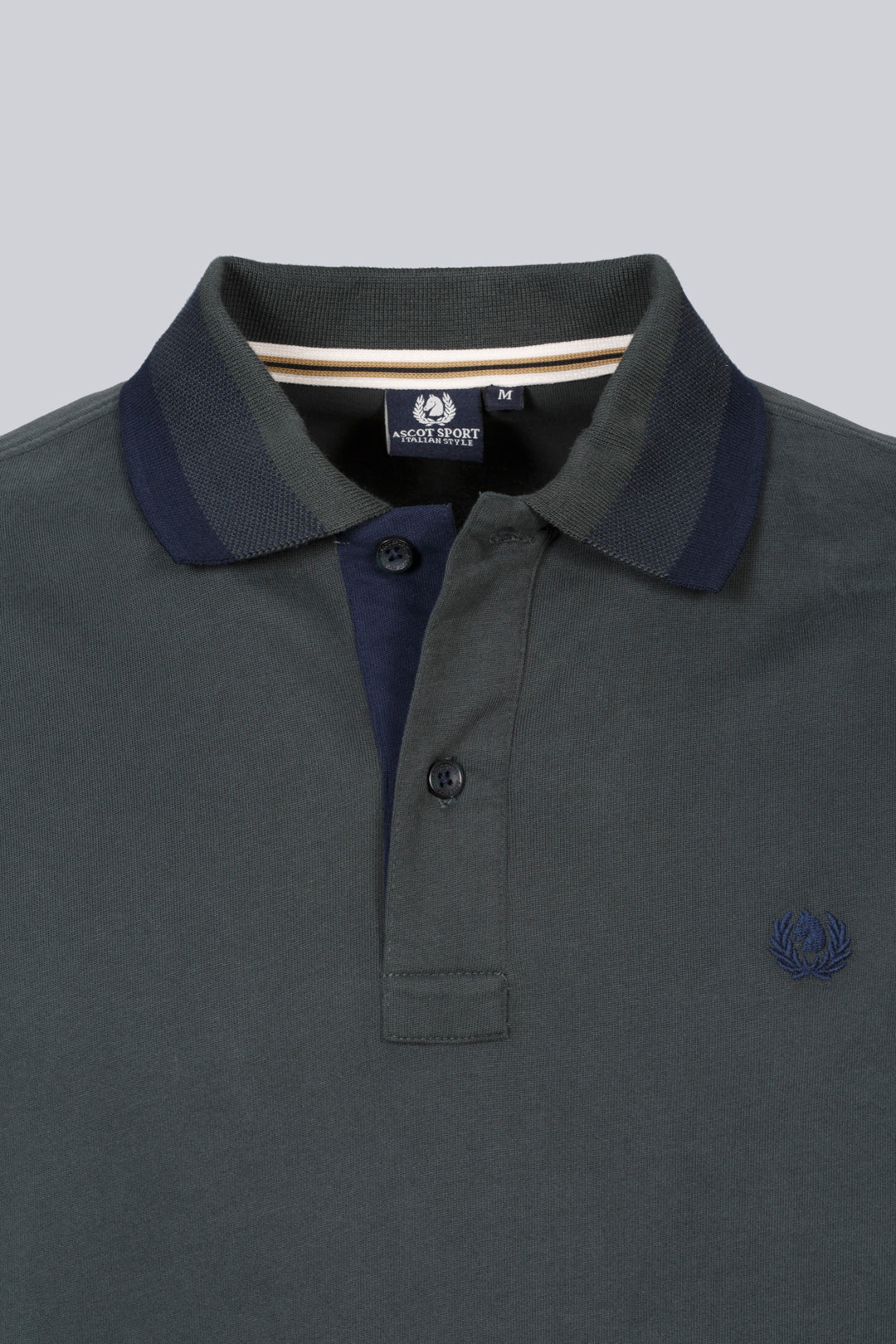 Green polo with contrasting details