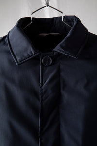 Cappotto tecnico con imbottitura thermosaldata e bottoni in tono colore