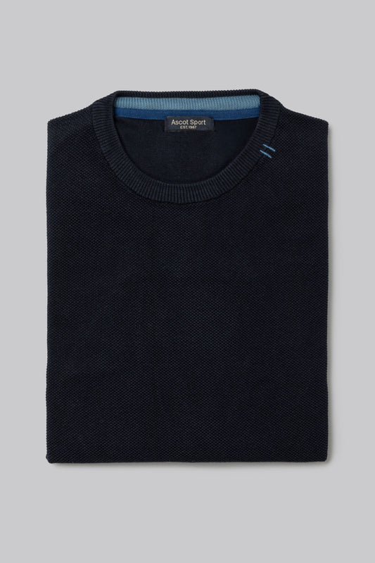 Crew neck sweater with jacquard pattern on the front and contrasting colors