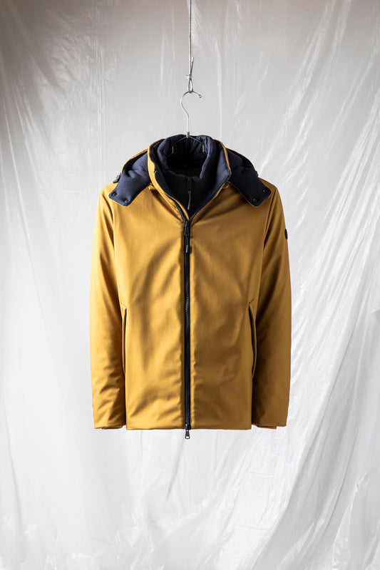 Padded jacket in technical fabric with hood and detachable bib