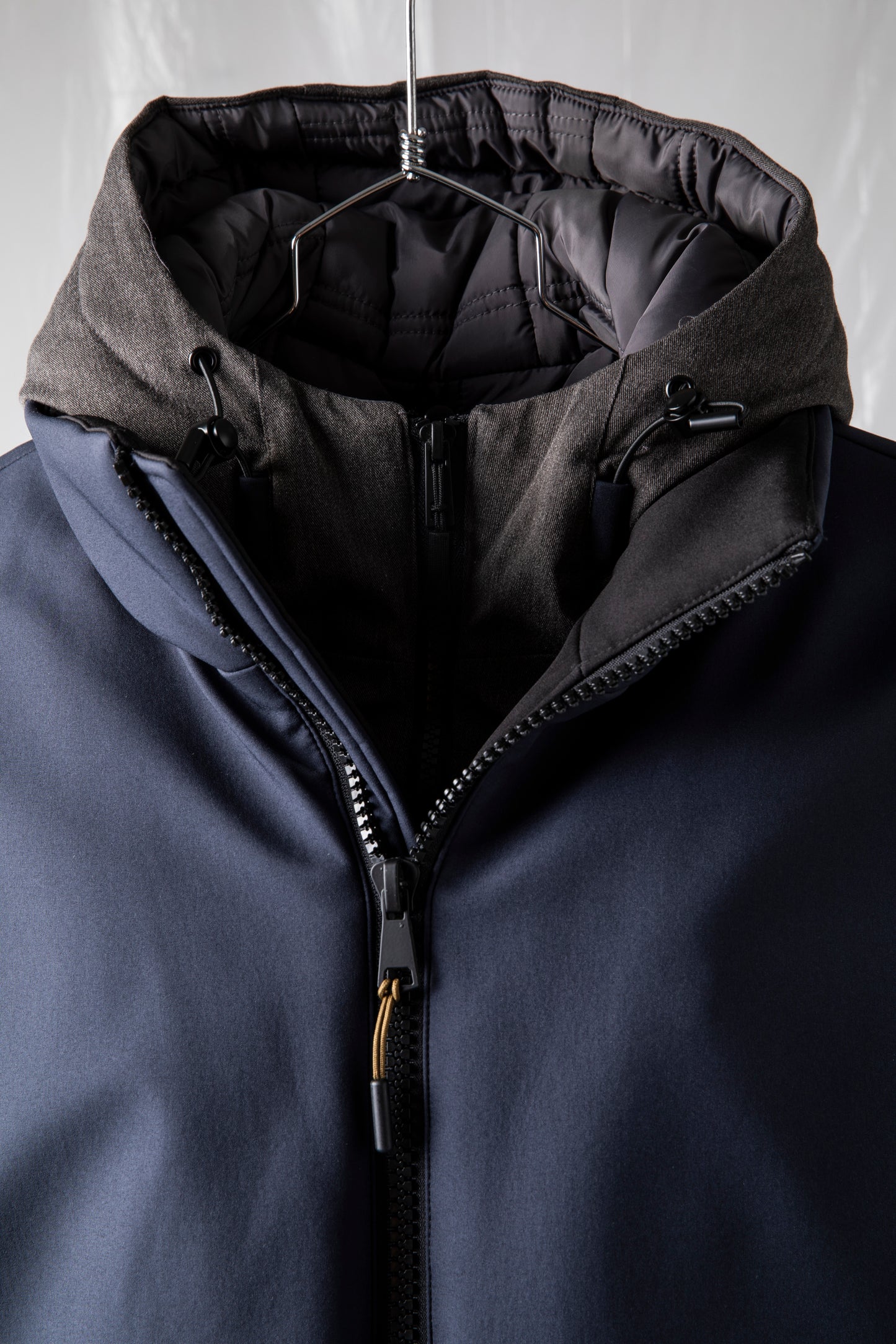 Jacket with bib and detachable hood in mélange effect