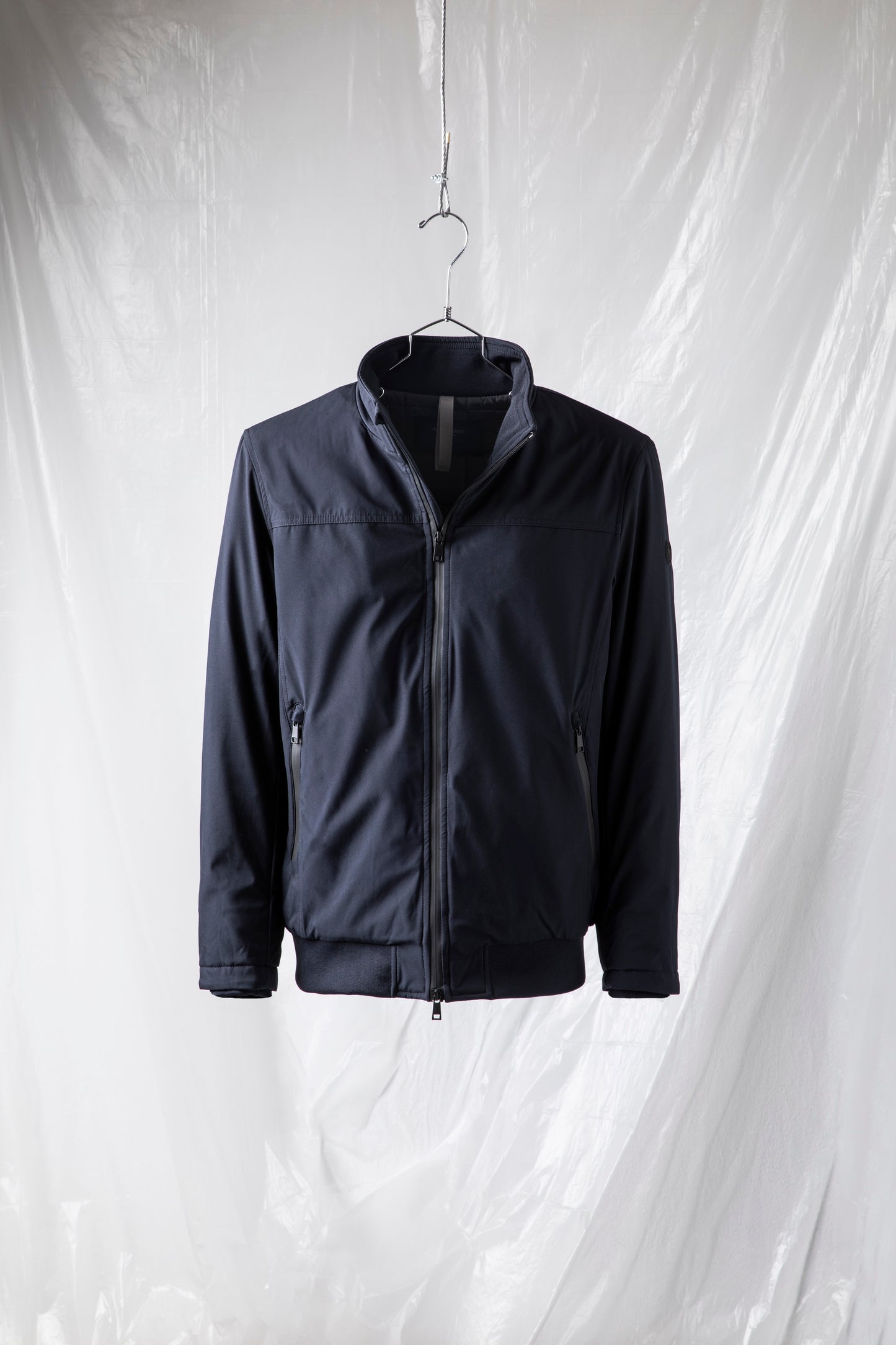 Short padded jacket in technical fabric