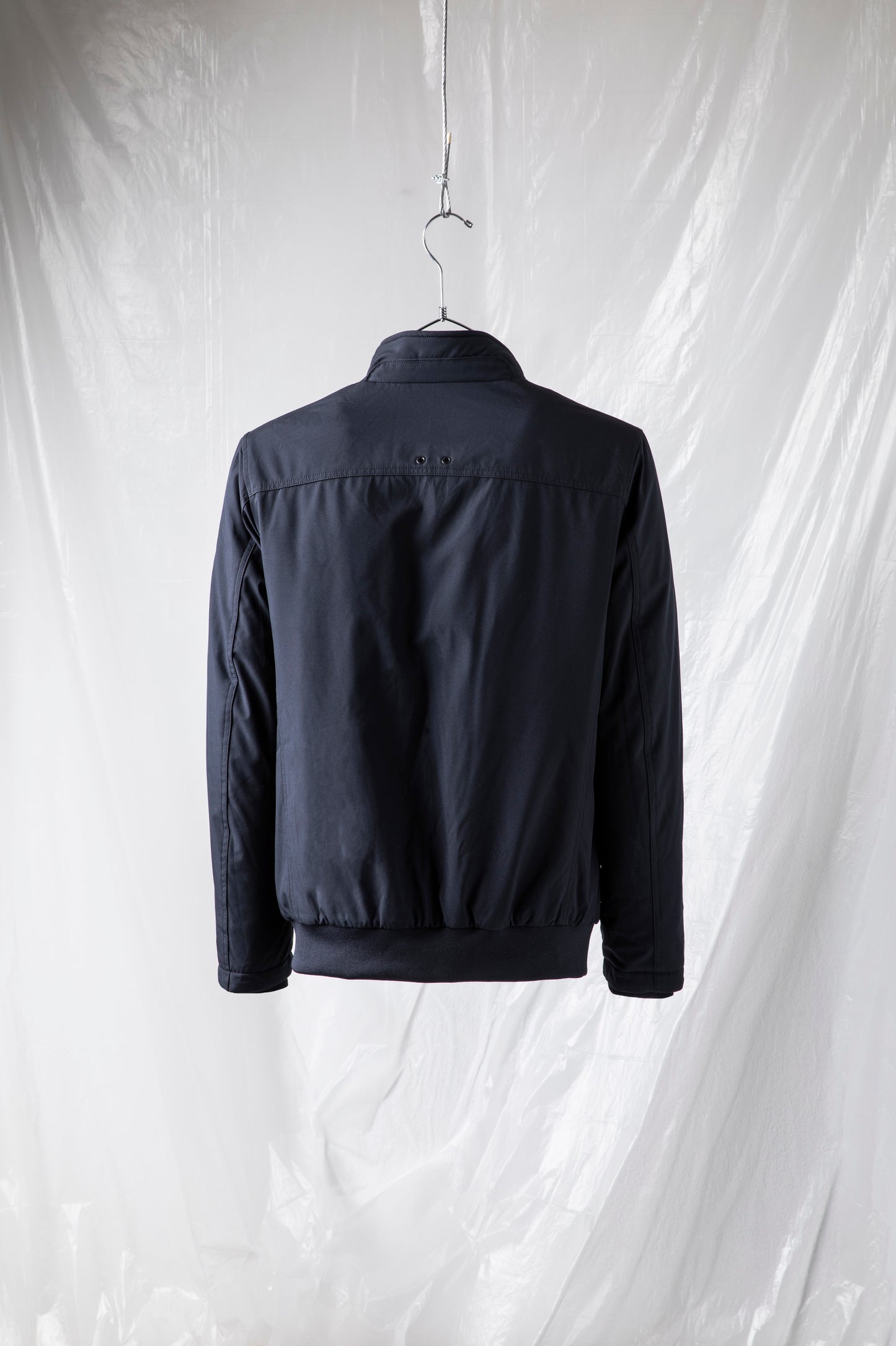 Short padded jacket in technical fabric