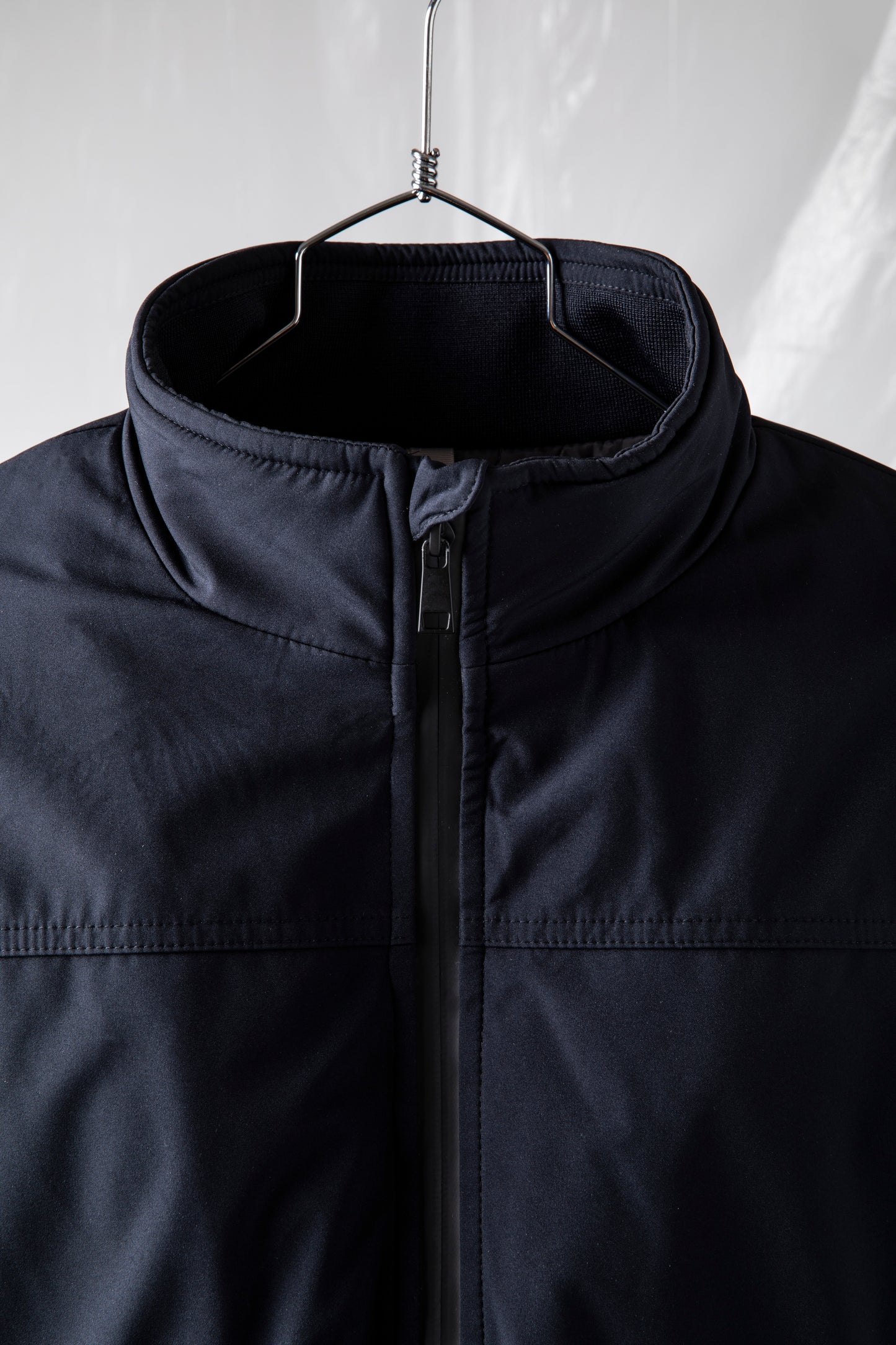 Short padded jacket in technical fabric