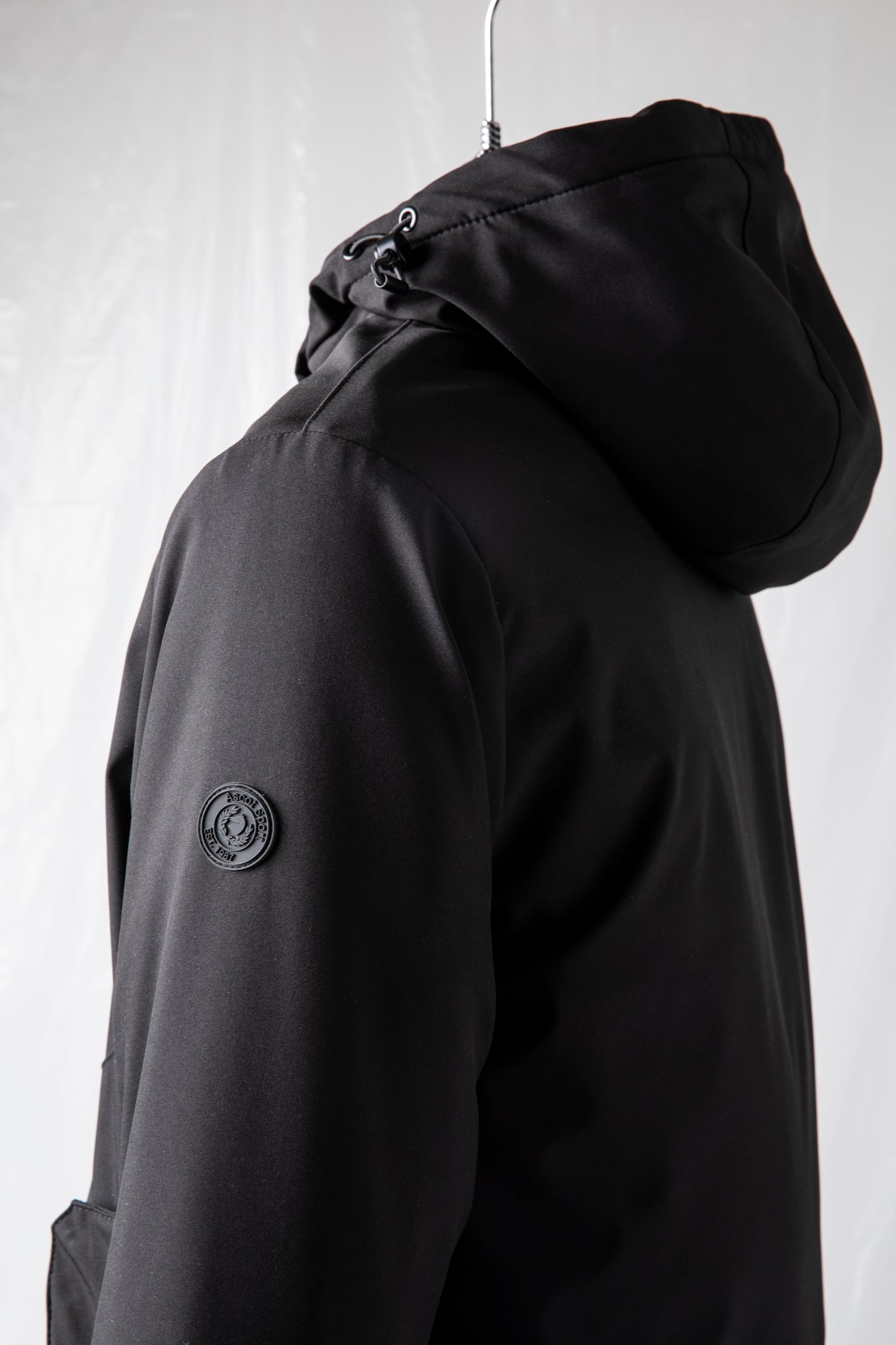 Short padded jacket in technical fabric