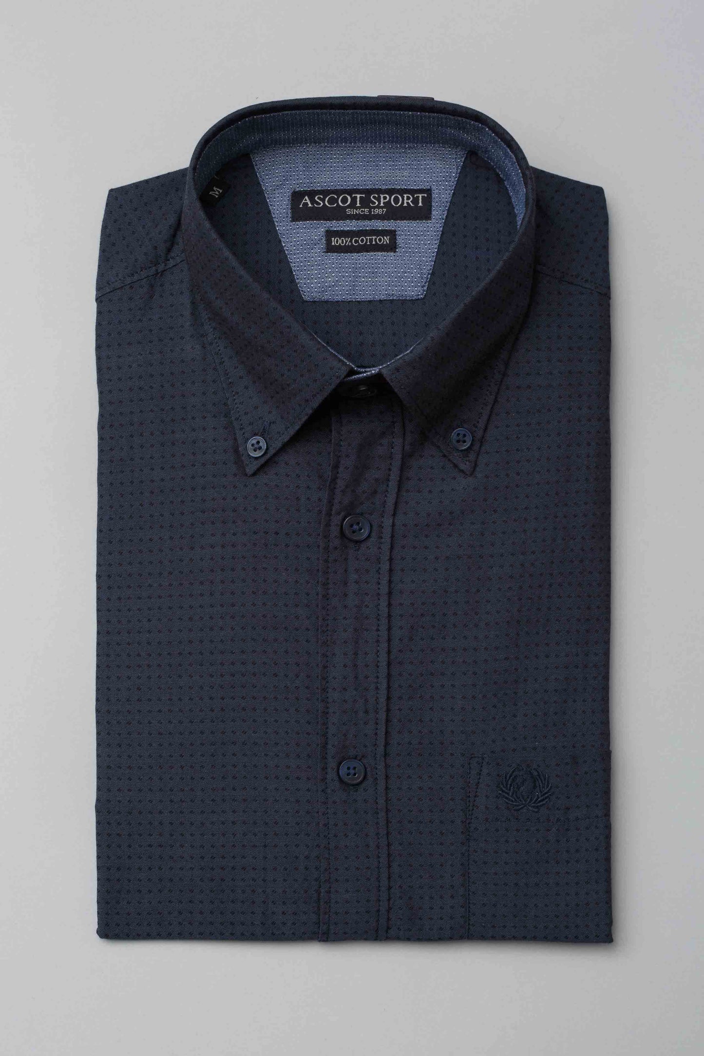 Blue shirt with polka dot jacquard effect