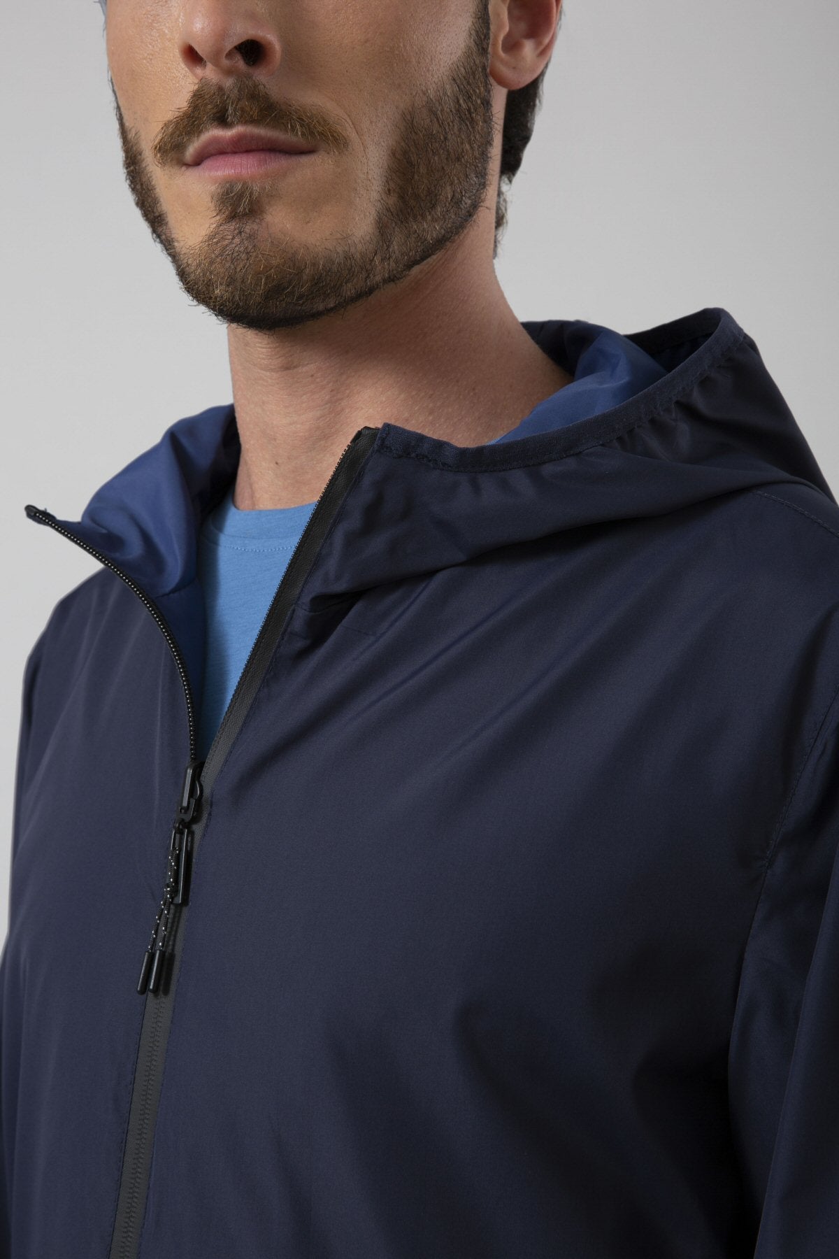 Reversible jacket with hood