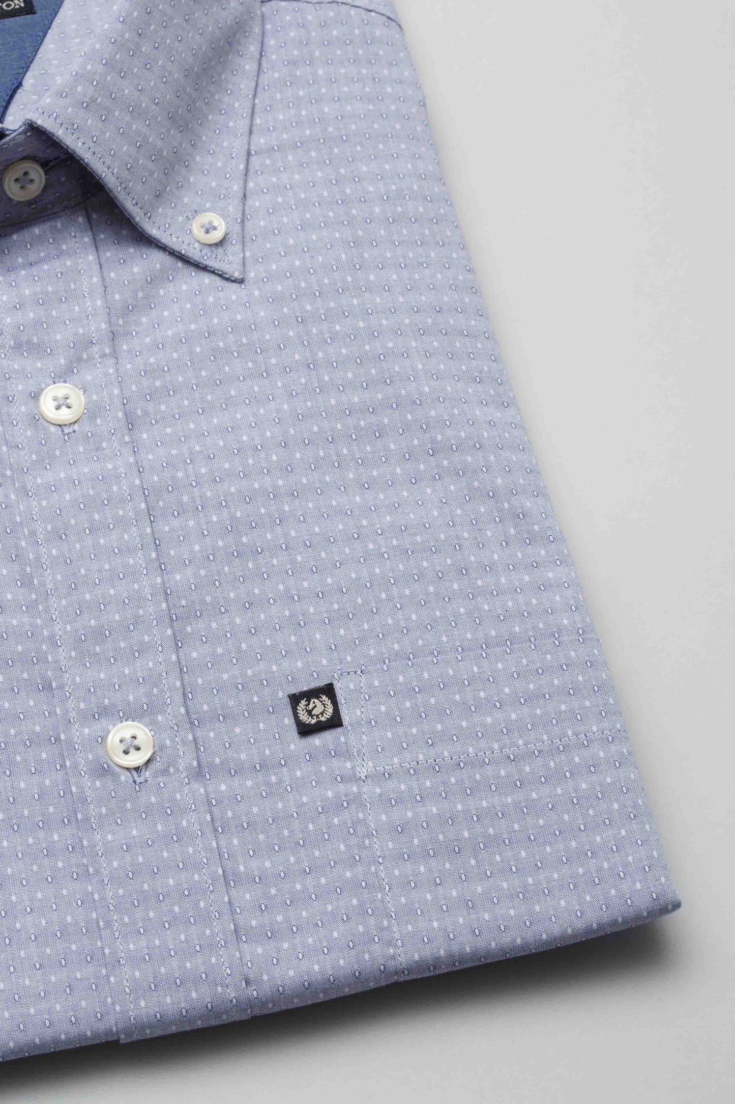 Blue shirt with geometric pattern